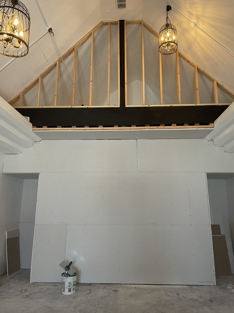 Ceiling drop framed and partially drywalled to conceal HVAC ductwork in a Mission Hills home
